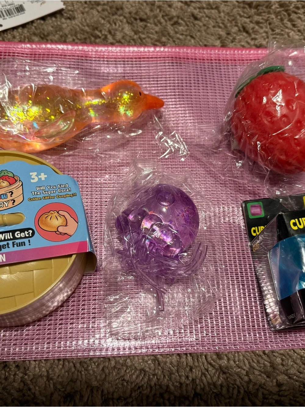 Assorted Kids Sensory Toy Set - Pink Mesh Pouch with Red, Purple, Orange Toys